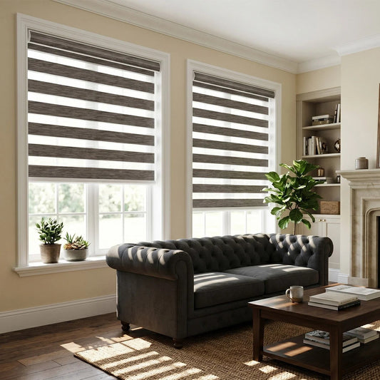 Living room with gray striped window blinds, a dark gray sofa, and a wooden coffee table.