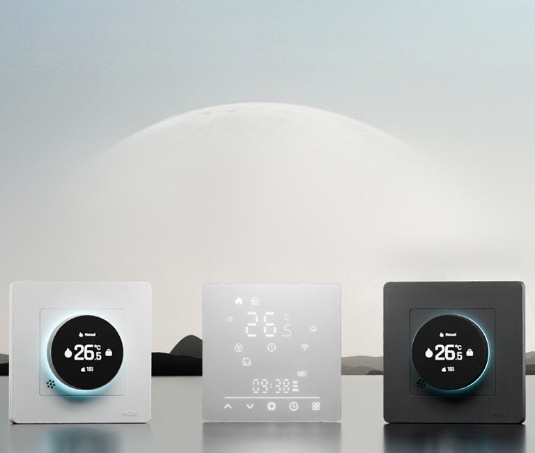 MOES digital smart temperature controllers with illuminated screens showing room temperature settings.