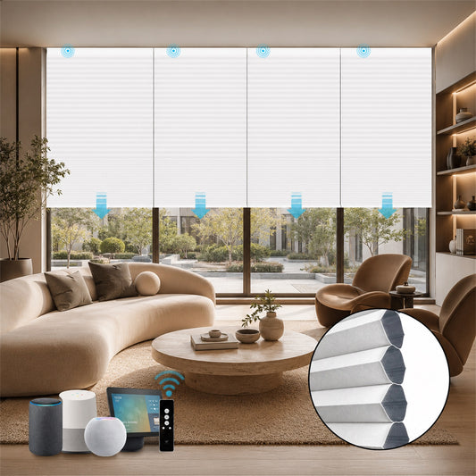 A modern living room scene showing white roller blinds partially drawn across large windows, with furniture including a curved beige sofa, round coffee table, and brown armchairs. A circular inset at the bottom right shows close-up details of the blind slats and track hardware.