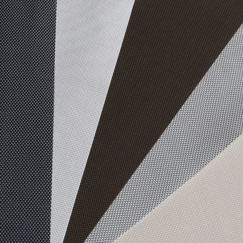 Close-up of fabric with black, gray, and white diagonal stripes.